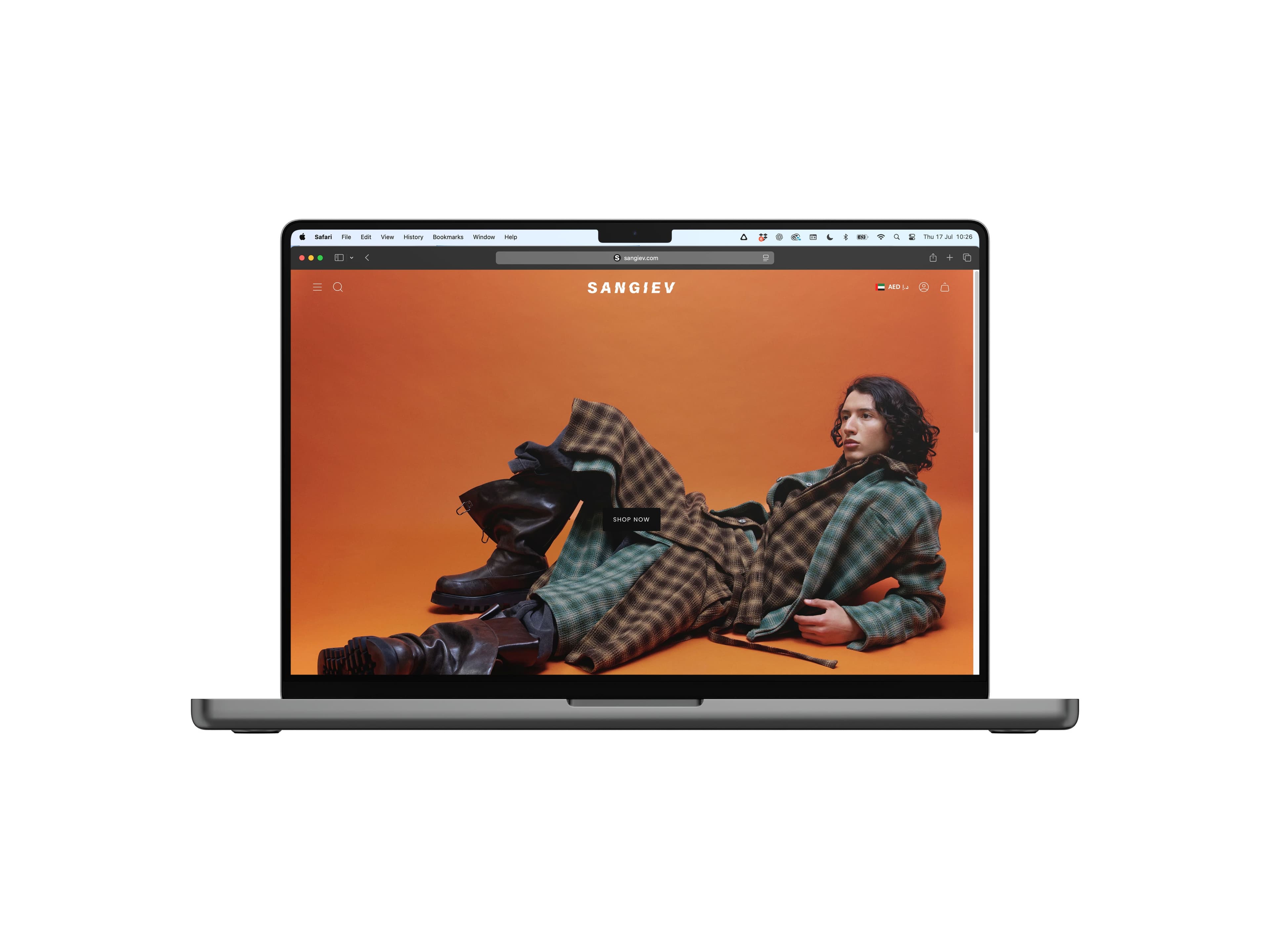 The Sangiev campaign homepage displayed on a laptop against a quiet white studio background.